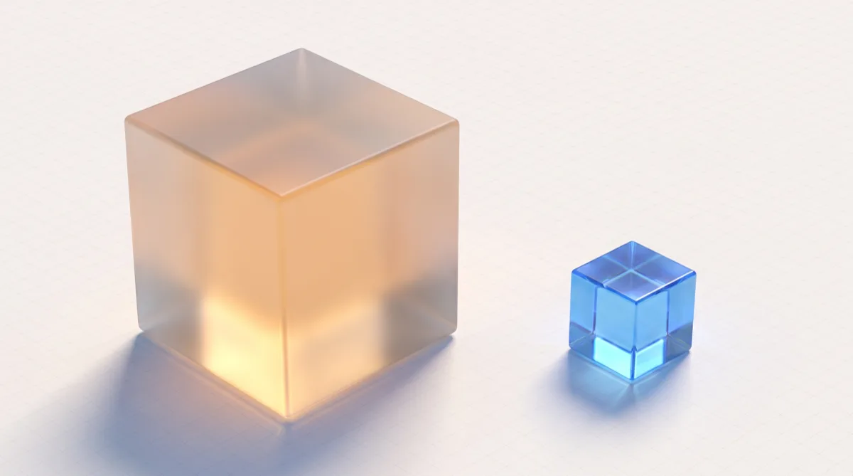 One oversized glass storage cube dwarfing a much smaller one